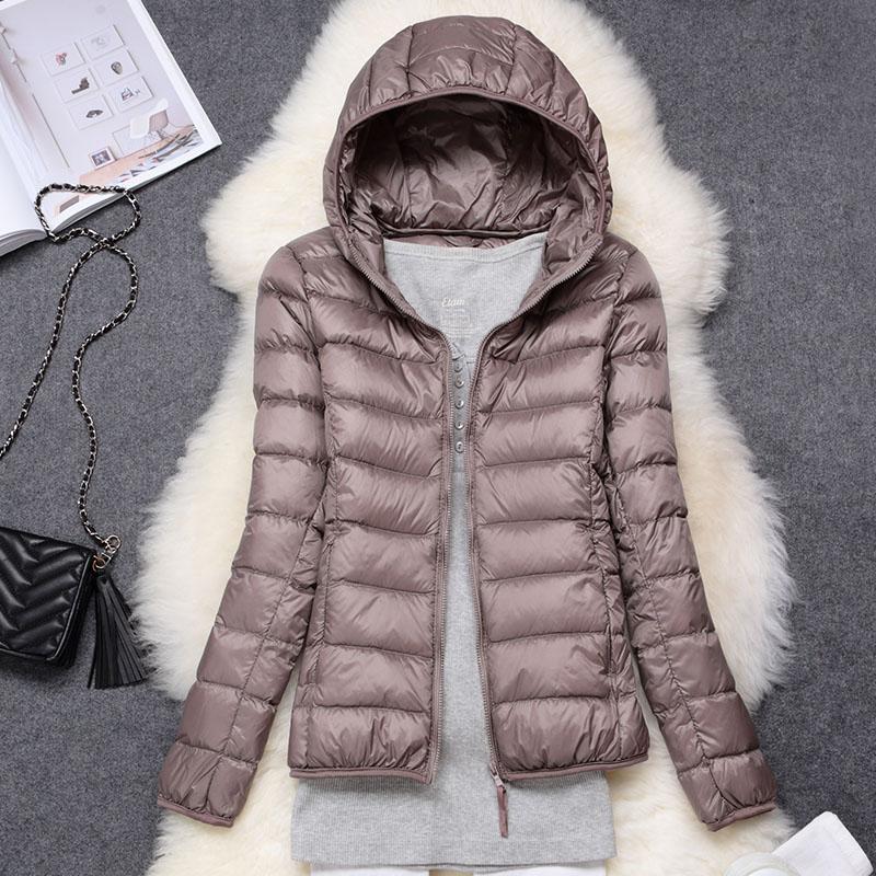 Veste élégante avec isolation luxueuse et capuche amovible