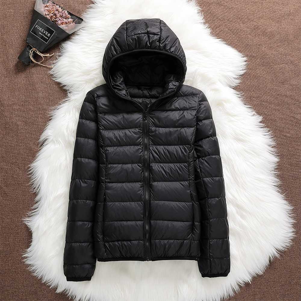 Veste élégante avec isolation luxueuse et capuche amovible - Image 2