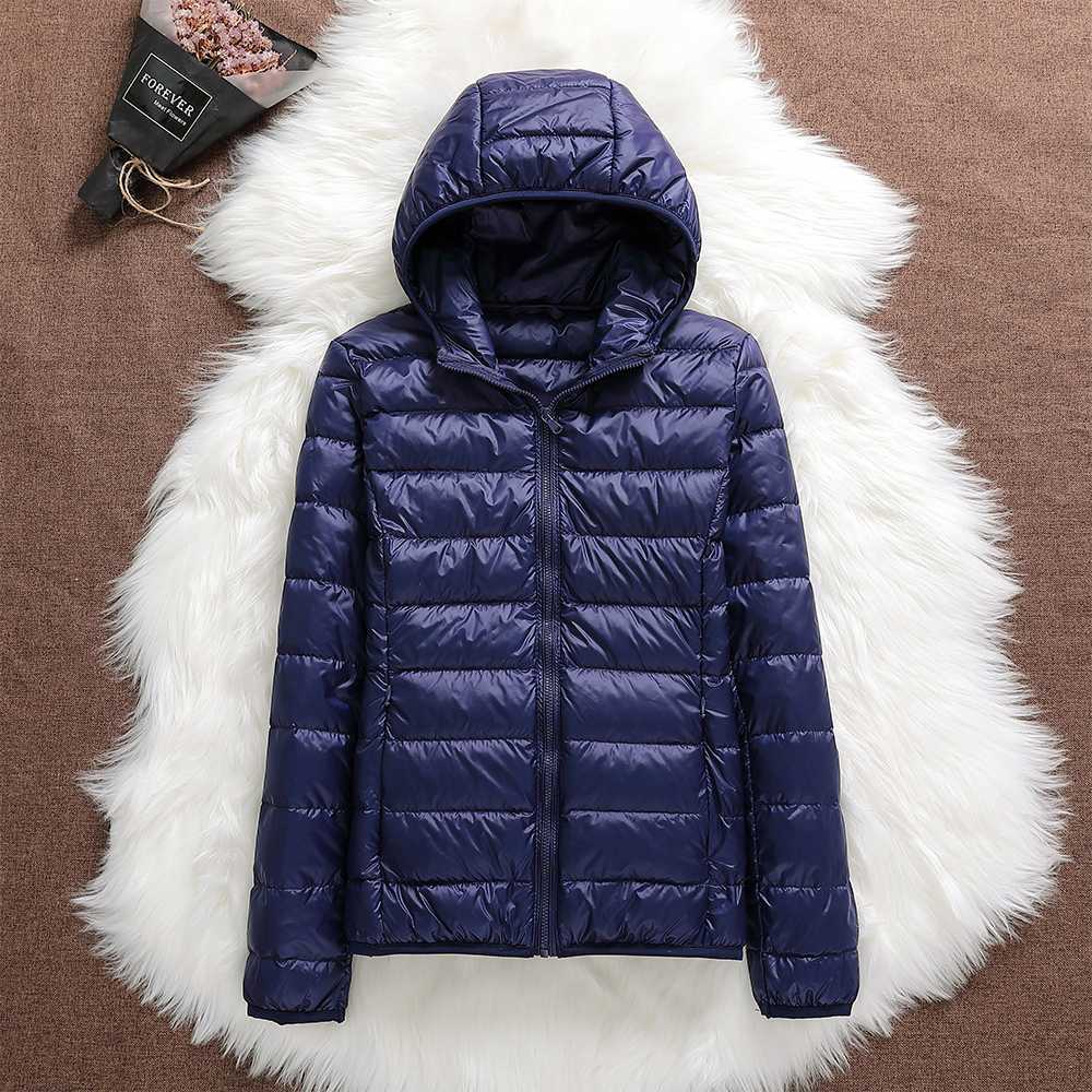 Veste élégante avec isolation luxueuse et capuche amovible - Image 3