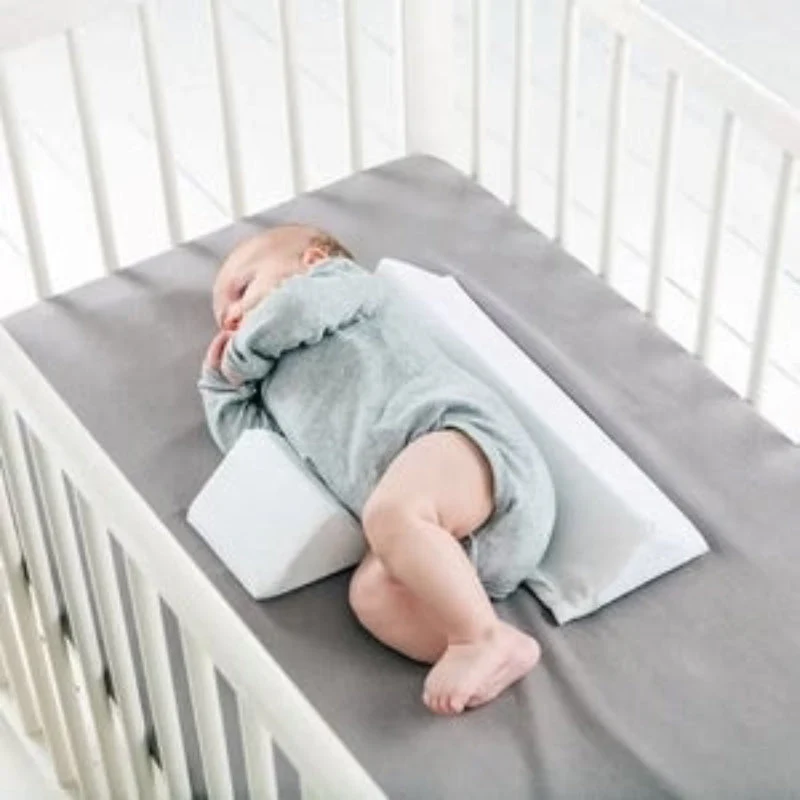 Oreiller anti-roulement pour bébé