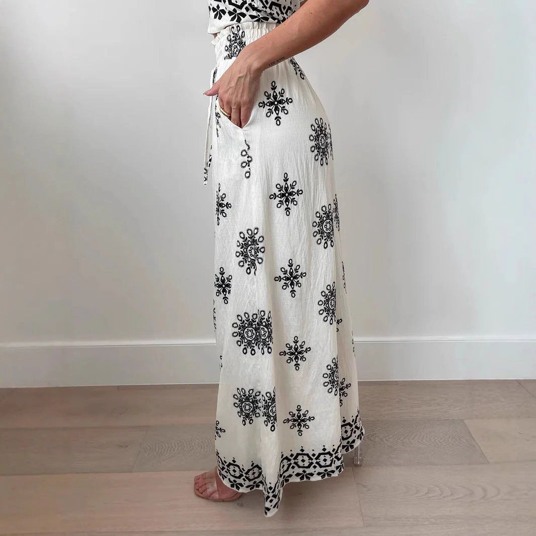 Selina – Ensemble deux pièces élégant composé d'un haut sans manches et d'un pantalon à jambes larges - Image 3